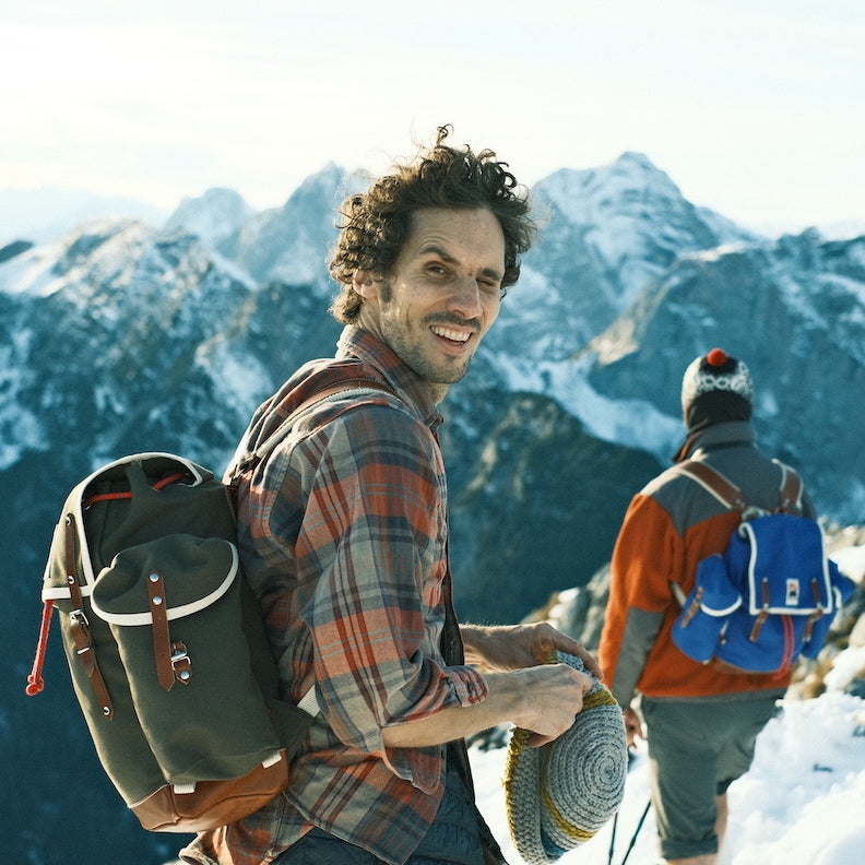 MATRA canvas vintage style backpack on mountain top